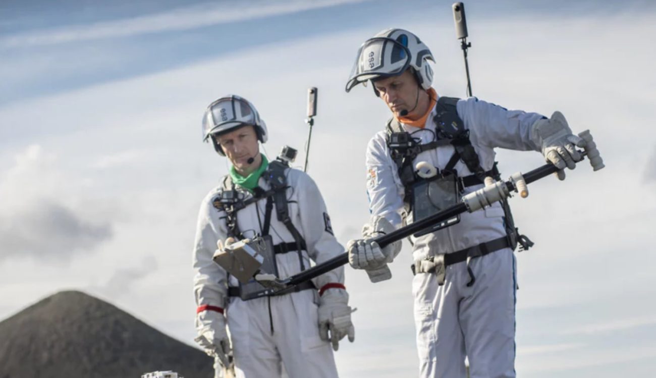 The astronauts practiced moon walking on the surface of volcanoes