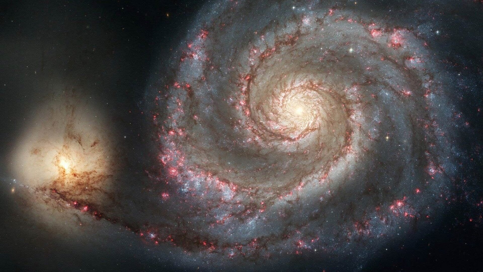 Varför är vissa galaxer spiral formad?